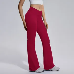Cross-waist flare yoga pants, high-stretch seamless athletic trousers for running and fitness.