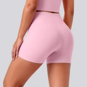 Pink high-waisted yoga shorts for women, buttery soft athletic fitness running gym activewear.