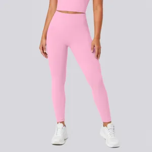 Detail view of pink high-waisted seamless yoga leggings, elastic fitness activewear pants