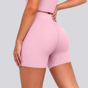 High-waisted pink yoga shorts for women, seamless elastic gym fitness running activewear.
