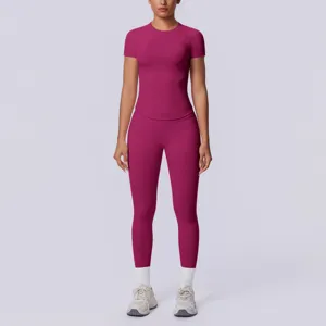Naadloze gebreide effen korte mouw yoga top en strakke lange broek fitness sport set