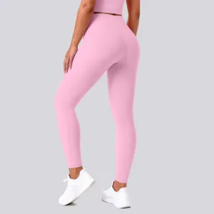 Pink high-waisted seamless yoga leggings for women, athletic fitness running gym tights.