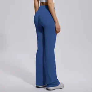 High-waist crossover flare yoga pants for women, butt-lifting seamless activewear leggings.