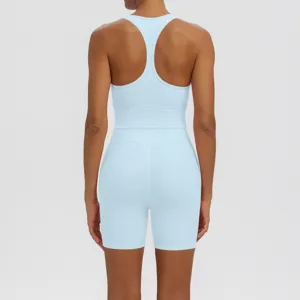 Solid color racerback sports bra and tight shorts yoga set for women fitness running workout.