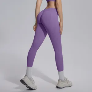 Seamless V-waist fitness yoga pants for women, breathable knit butt-lifting gym sports leggings.