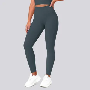 High-waisted seamless athletic yoga leggings detail shot, stretchy fit, dark gray color.