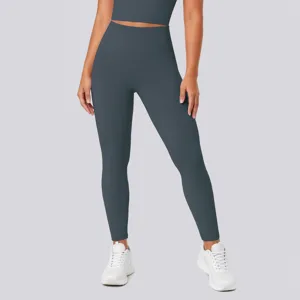 Detailed shot of high-waisted butt-lifting yoga pants in sleek dark grey stretch fabric.