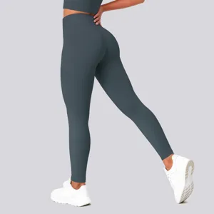 High-waisted solid color fitness yoga leggings for women running and gym workouts detail.