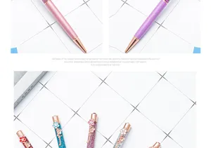 Creative glitter quicksand ballpoint pen with shiny metal barrel and floral charm detail.