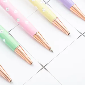 Pastel color ballpoint pens featuring cute four-leaf clover pattern and elegant rose gold tips.