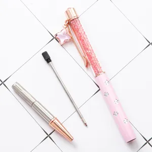Pink crystal ballpoint pen with clover pendant, elegant rose gold metal gift pen for office