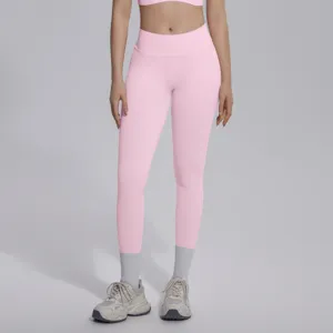 Pink seamless knitted high waist fitness yoga pants detail showing breathable fabric.