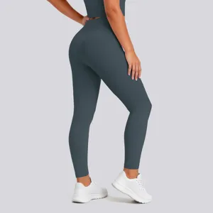 Close-up detail of the dark grey high-waist butt-lifting tight yoga pants and crop top set.