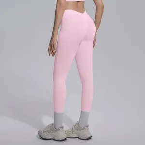 Detailed back view of pink seamless V-waist breathable hip-lifting yoga leggings for sports.