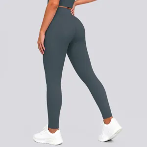 High-waisted solid color compression fitness yoga leggings back view detail showcasing fit
