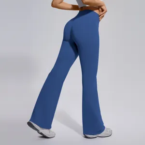Detailed view of blue high-waisted seamless flare yoga pants for running and fitness.