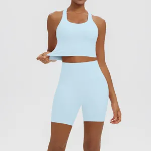 Light blue women yoga set gym crop top and high waist biker shorts fitness activewear.