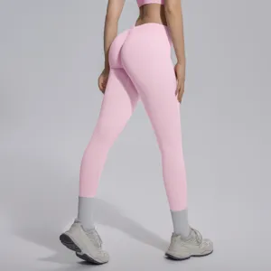 Details of the pink seamless knit V-waist butt-lifting yoga pants showing the back fit.