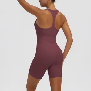 Women solid color activewear yoga romper, breathable fitness athletic jumpsuit for sports gym training.