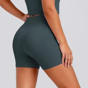 High-waist seamless yoga shorts detail, breathable stretch activewear for fitness and running.