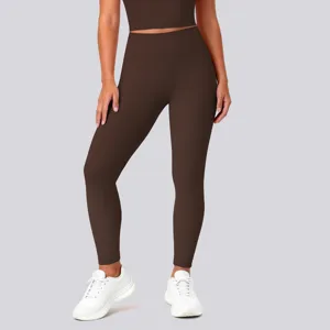 High-waist tight yoga pants detail view, solid color butt-lifting athletic fitness leggings.