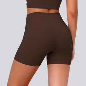 High-waist tight yoga shorts in dark brown, back view detail shot showing stretchy fabric.