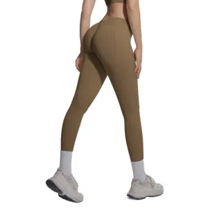 Seamless knit solid V-waist slim fit breathable hip-lifting yoga athletic pants for running fitness.