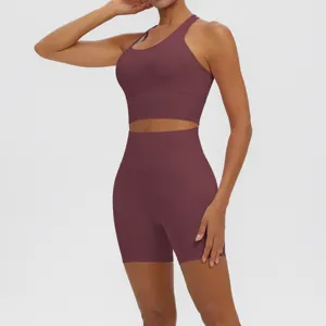 Solid color breathable yoga set detail featuring a stylish backless sports bra and high shorts.