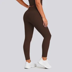 High-waist contouring brown yoga leggings for workout, fitness, and running apparel detail.