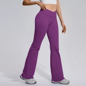 Purple crossover high waist flare yoga pants detail showing stretchy fabric and slim fit.