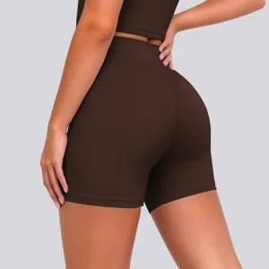 High-waist brown yoga shorts detail view, featuring stretchy, breathable fabric for workouts.