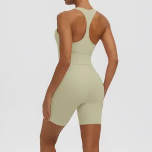 Back view detail of sage green activewear set, breathable racerback tank and shorts.