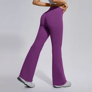 Detail view of purple high waist bootcut yoga pants, back shot showing body shaping fit.