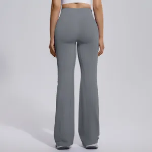 Grey high-waist flare yoga pants with crossover waist for tummy control, perfect for gym fitness.