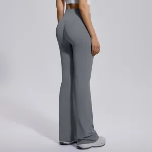 Back view detail of high-waisted grey flared yoga pants with butt-lifting design.