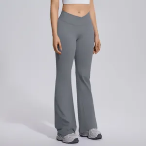 Grey crossover high waist flared yoga pants detail, seamless design, stretchy fitness leggings.