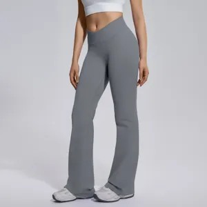 Detail view of women's crossover high waist flare yoga pants, offering tummy control and stretchy fit.