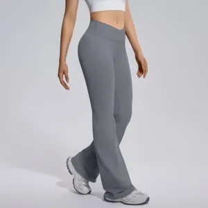 Close-up detail of high waist cross-over flared yoga pants, soft stretchy athletic fabric.