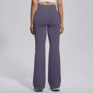 Detailed back view showing the high waist and flare cut of the purple fitness yoga pants.