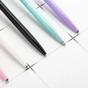 Colorful metal ballpoint pens set, smooth writing office and school stationery supplies.