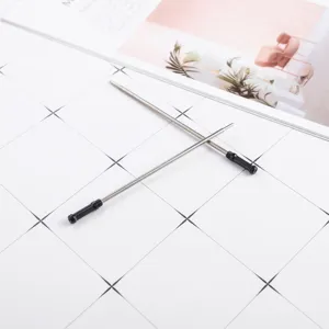 Metal pen refill replacement with black cap, durable stationery supply for daily office writing use.