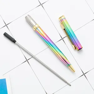 Colorful electroplated metal ballpoint pen flat lay display with refill and protective cap.