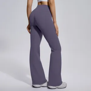 Detailed view of high-waisted flared yoga pants back design, shaping and stretchy activewear.