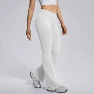 Close-up of women crossover waist flared yoga pants, high stretch comfort fabric detail.