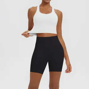 Detail view of solid color sports bra and high waist yoga shorts set for fitness.