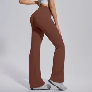 Detail view of women's high-waisted brown flare yoga pants showing slim fit and stretch fabric.