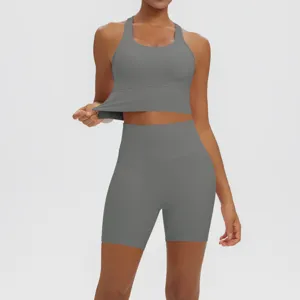 Solid color ribbed yoga set detail, breathable fitness workout crop top and high waist shorts.