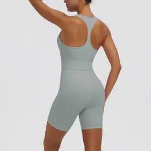 Grey seamless ribbed yoga set two piece activewear gym crop top and biker shorts for women workout.