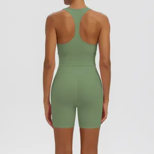 Detailed rear view showcasing green yoga sports bra and high waist shorts activewear.