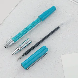 Blauwe kristallen gelpen met sprankelende strass-steentjes, fijne vulling en metalen dop.